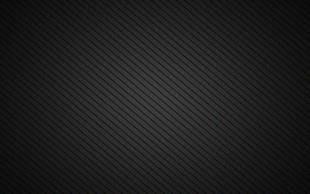 Minimalist dark wallpaper with subtle diagonal stripes on textured black background for desktops