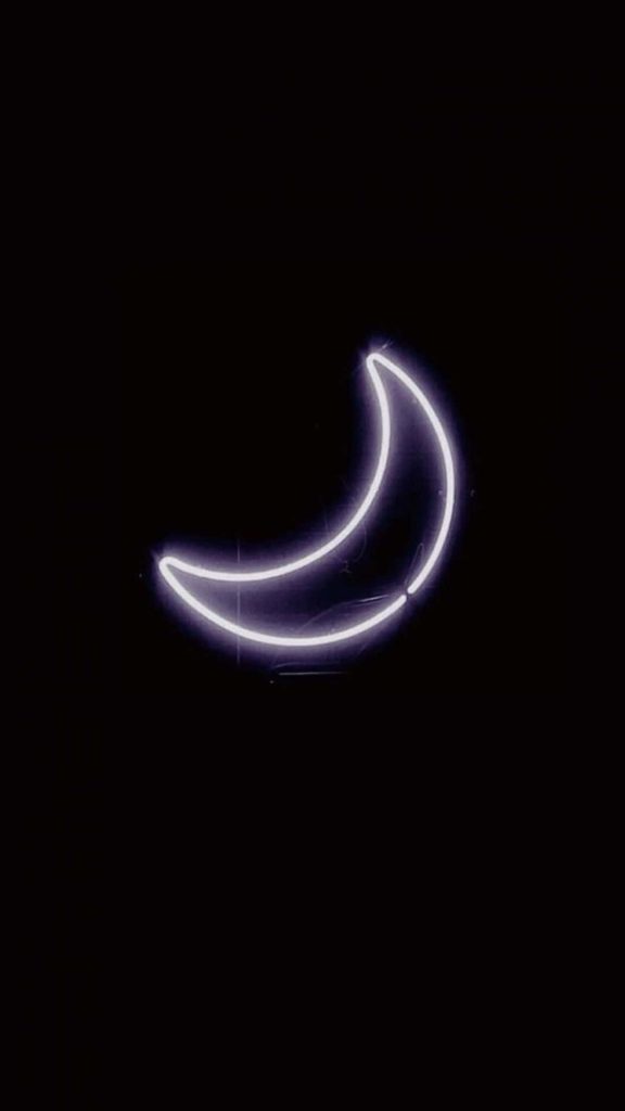 Minimalist dark iPad wallpaper with glowing neon crescent moon on black background for sleek look