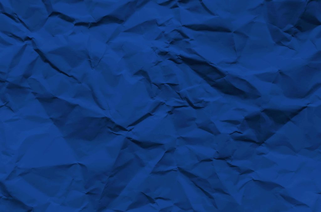 Minimalist crumpled paper wallpaper in vibrant deep blue with detailed texture and 3D effect