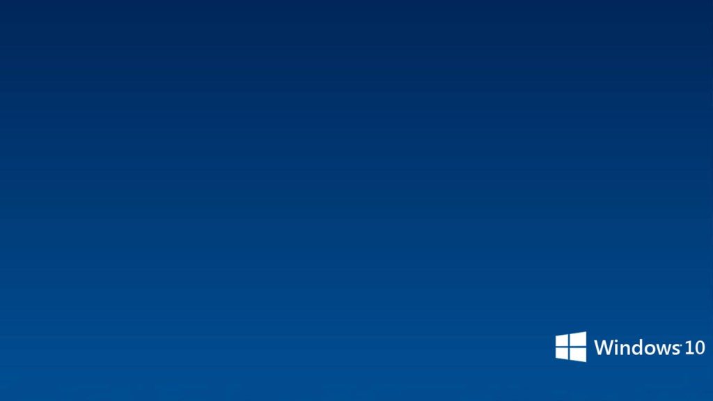 Minimalist Windows 10 wallpaper deep blue background with white Windows logo bottom right corner