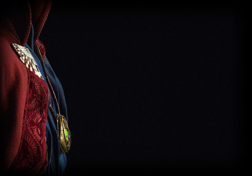 Minimalist Doctor Strange Wallpaper: Cloak & Amulet on Dark Background