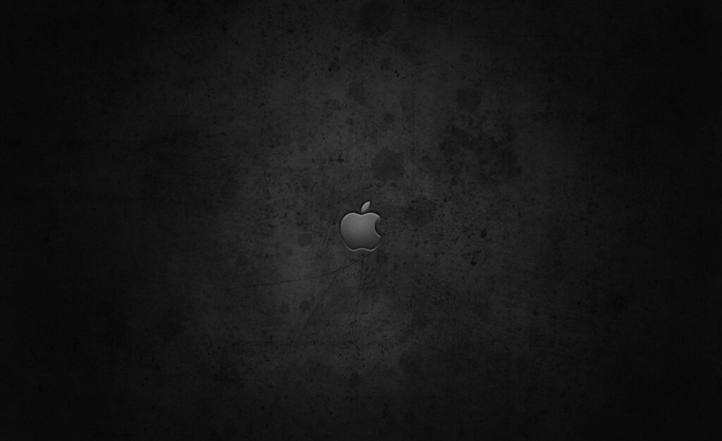 Grayed Out: A Captivating Dark Wall with Apple Logo Texture as Stylish Background Photo Wallpaper