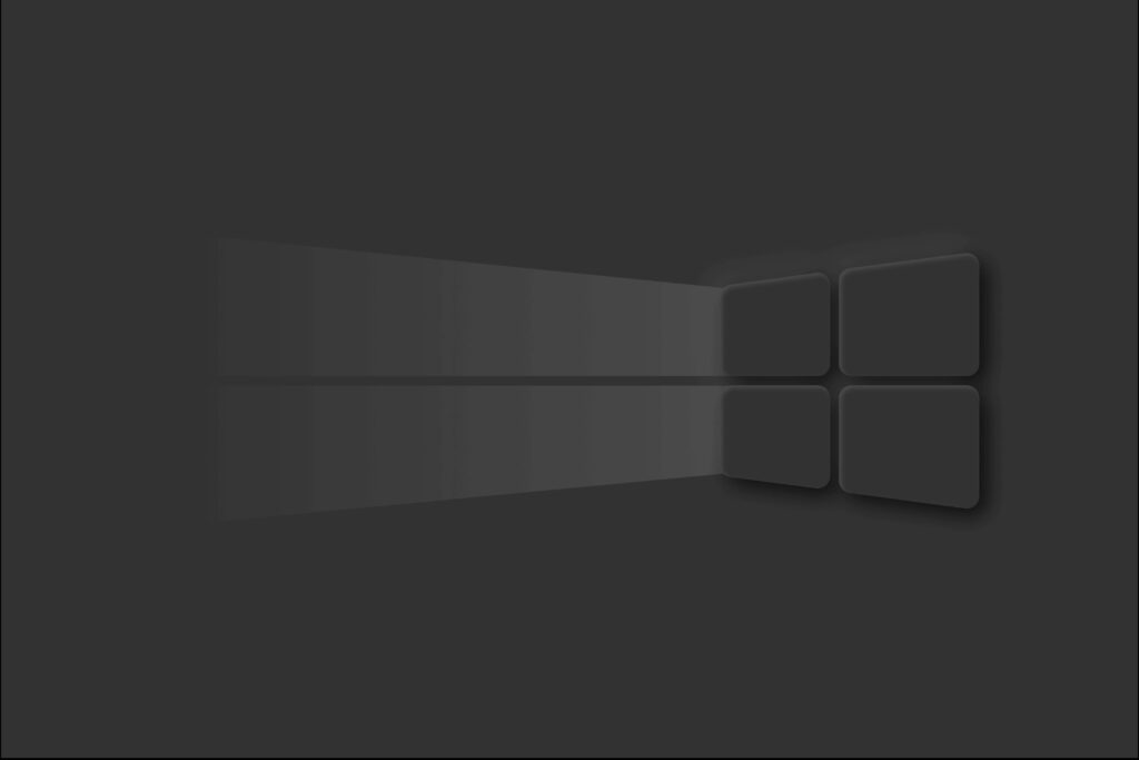 Minimalistic Elegance: Introducing the Matte Logo on a Sophisticated Gray Windows Wallpaper