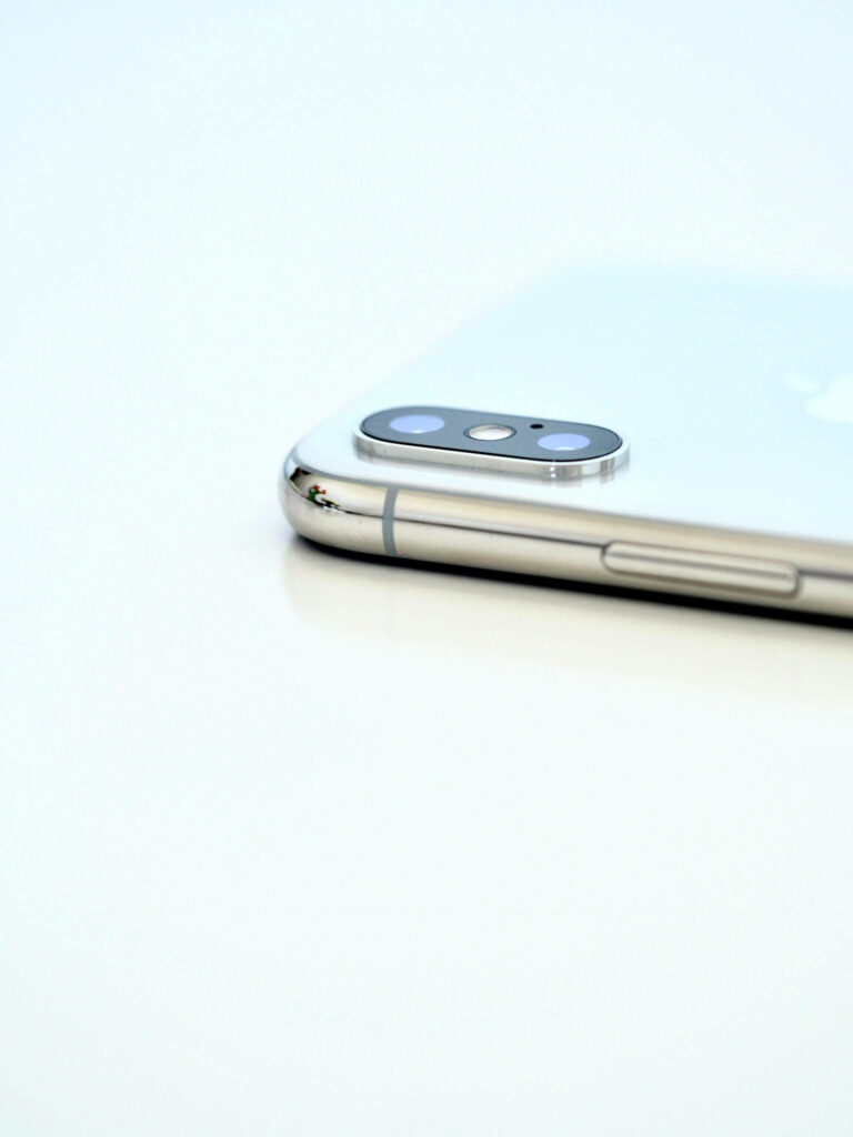 Minimalistic Smartphone Display on Clean White Background Wallpaper