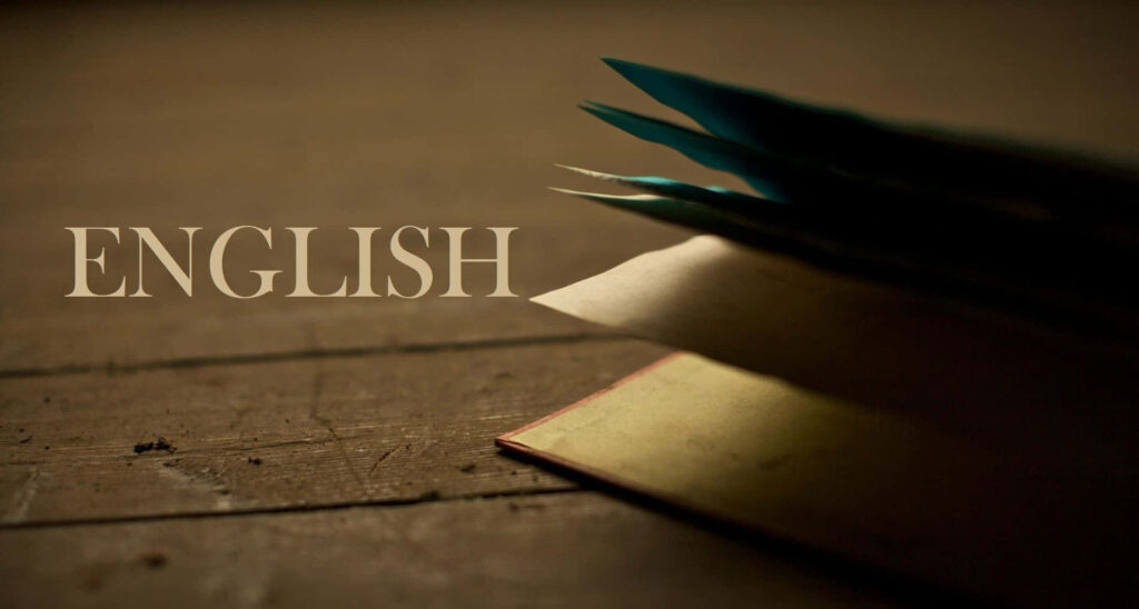 Minimalist English wallpaper with serif text and aged papers on wooden surface for classic study