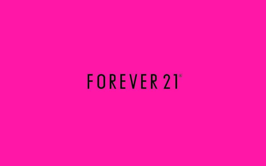 Minimalist Forever 21 logo in bold black on vibrant hot pink background trendy wallpaper