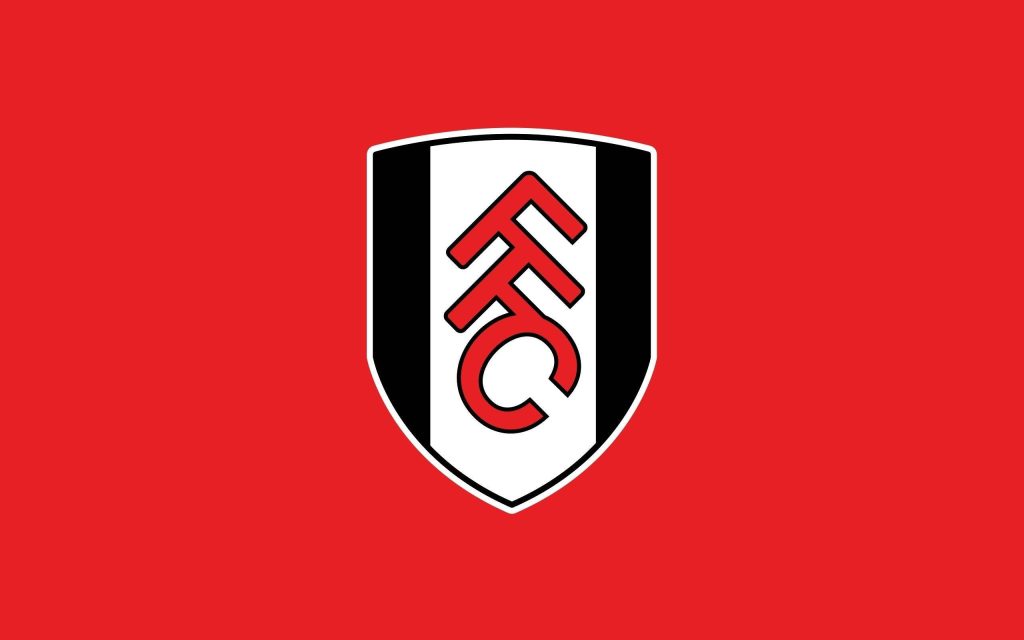Minimalist Fulham FC wallpaper with bold red background and classic black white FFC crest centered