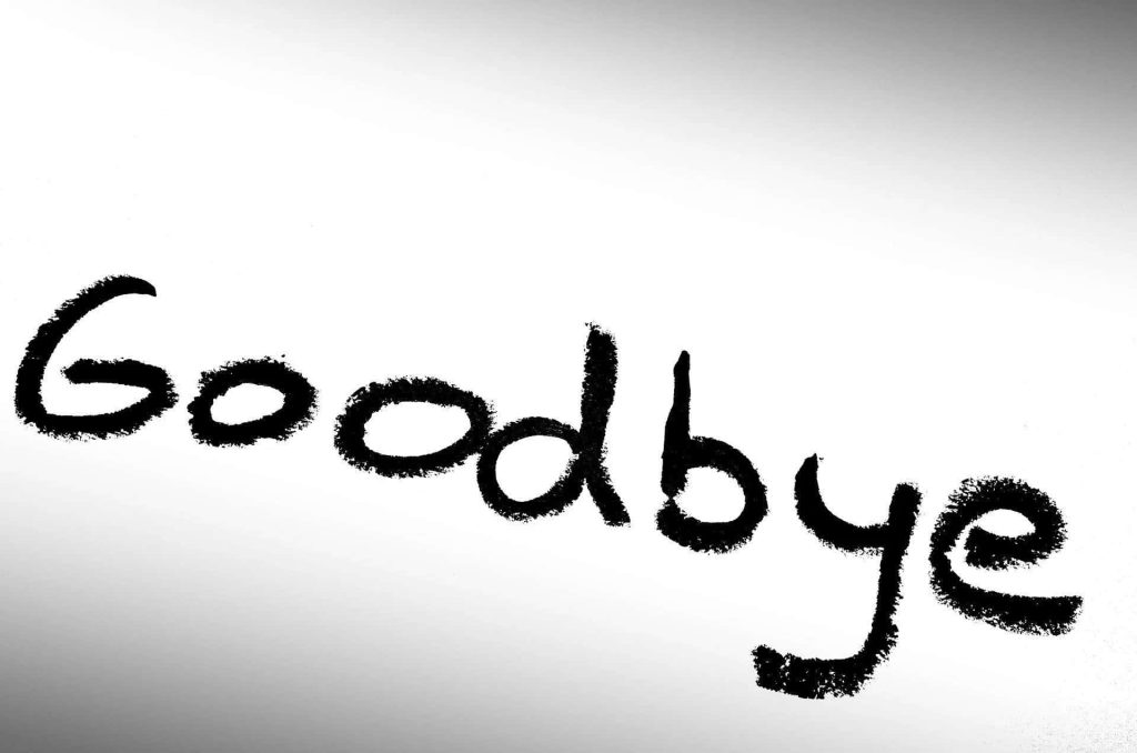 Minimalist wallpaper with bold black handwritten Goodbye on light grey background diagonal design