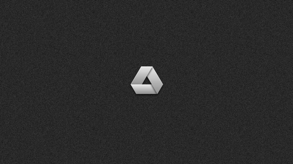 Minimalist Google Drive logo wallpaper in monochrome on dark grey textured background digital design
