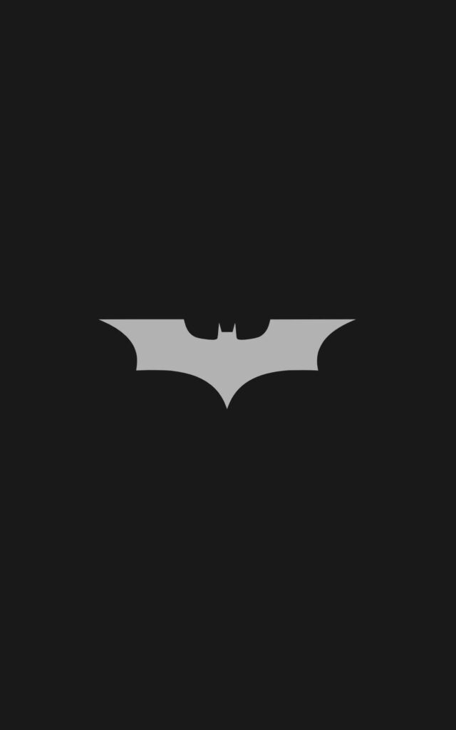 Minimalist iPhone wallpaper with sleek gray Batman logo on dark background superhero theme