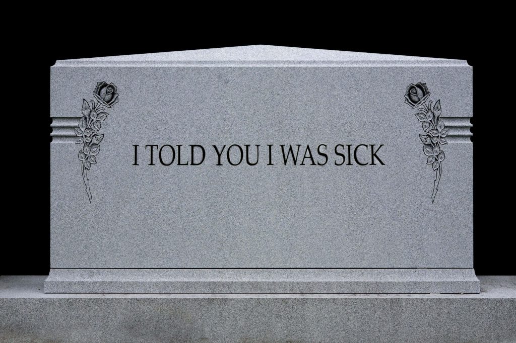 Gray granite gravestone engraved I told you I was sick with carved roses on black background Wallpaper