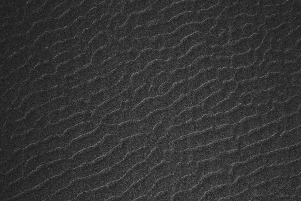 Minimalist Gray Textured Wallpaper with Soft Wavy Ridges