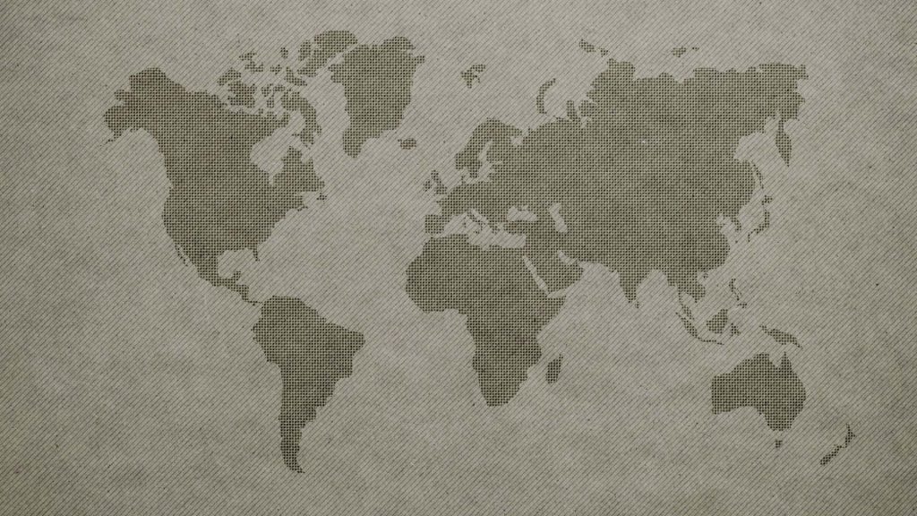 Minimalist gray world map wallpaper with dotted cross-stitch effect on textured fabric background