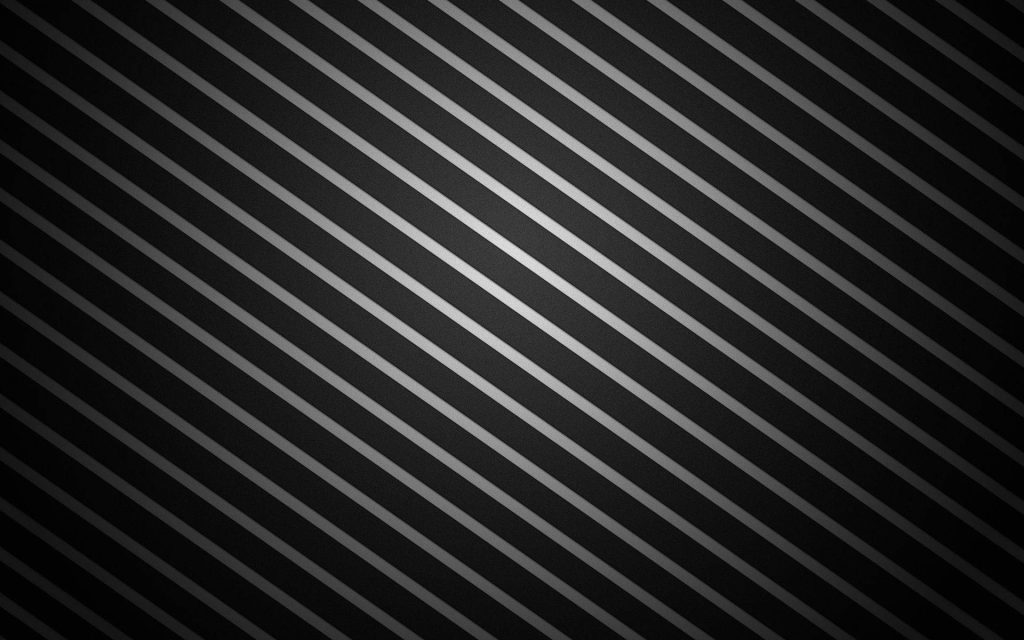 Minimalist wallpaper with diagonal gray and black stripes and soft gradient lighting effect