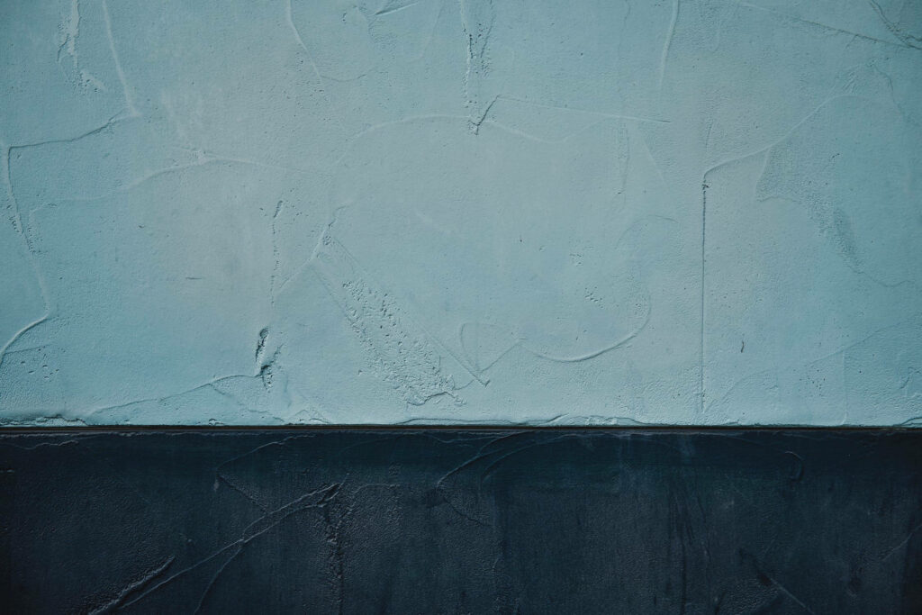 Minimalist Grayscale Concrete Wallpaper with Textured Tone Variations