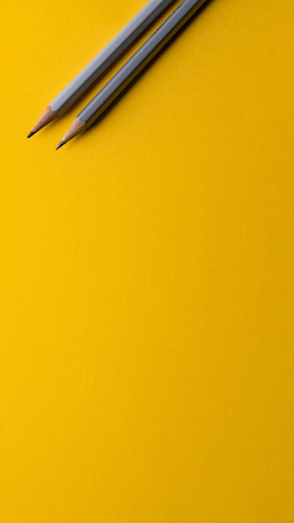 Minimalist Yellow Background with Grey Pencils: Simple Wallpaper