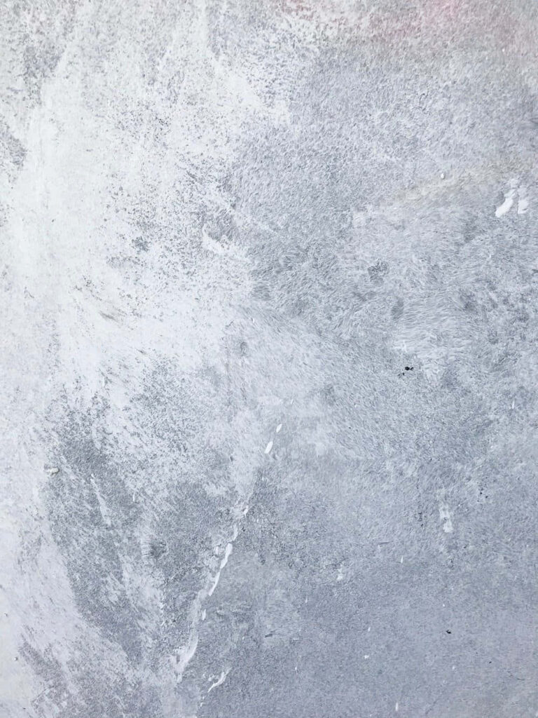 Minimalist Grunge Wallpaper: Textured Gray Concrete Surface Design