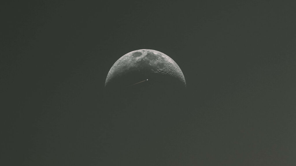 Minimalist Half-Moon Wallpaper: Serene Dark Space Background