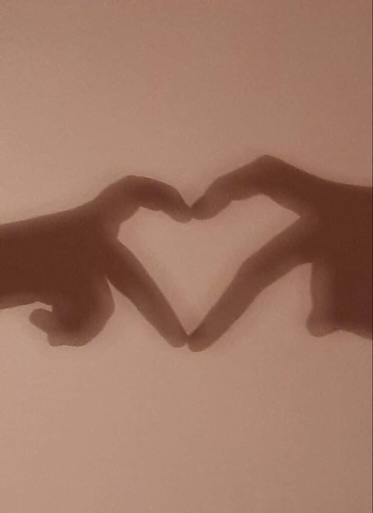 Minimalist Heart Shape Hands Wallpaper: Love & Connection Background