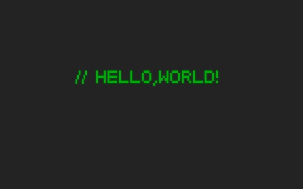 Minimalist Hello World wallpaper with retro green pixel art code on charcoal grey background