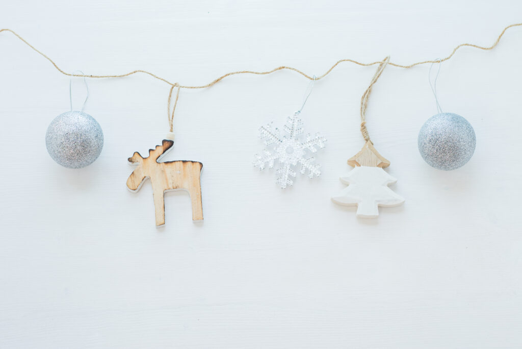 Minimalist Holiday Wallpaper: Festive Decorations on White Background