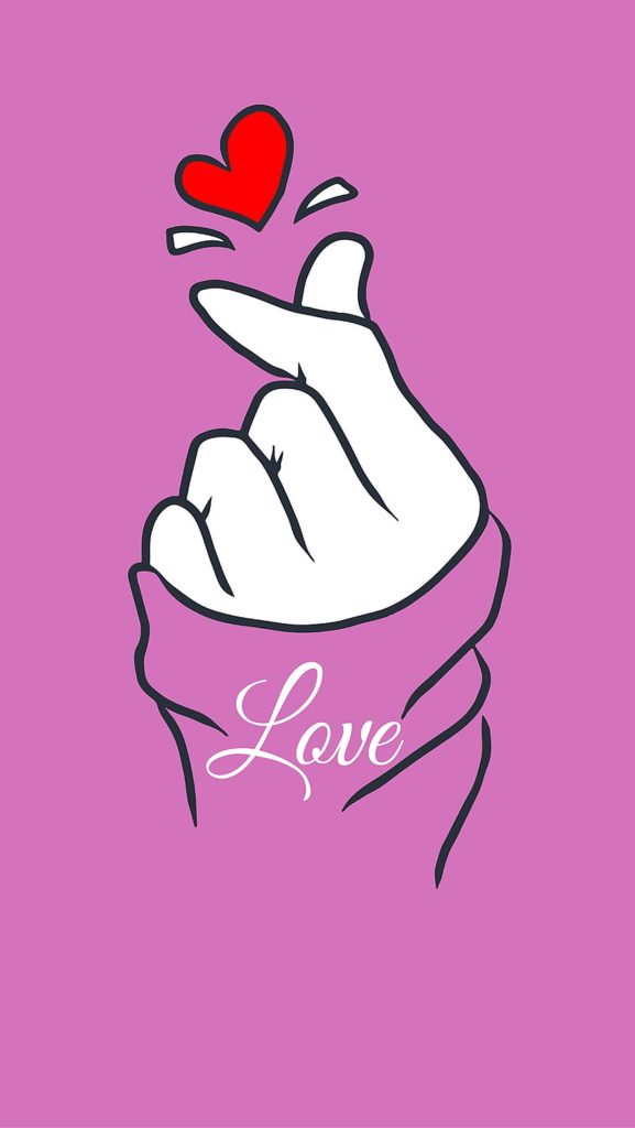 Minimalist Korean finger heart wallpaper with red heart and Love script on soft pink background