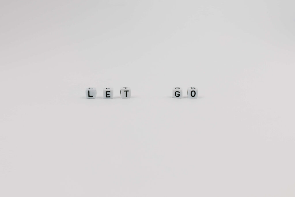 Minimalist LET GO Wallpaper: White Blocks on Clean Background