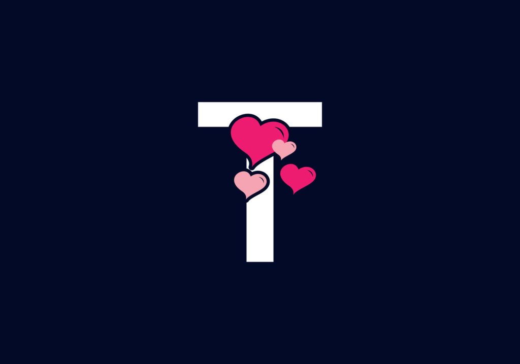 Minimalist white letter T wallpaper on navy blue with overlapping pink hearts romantic design