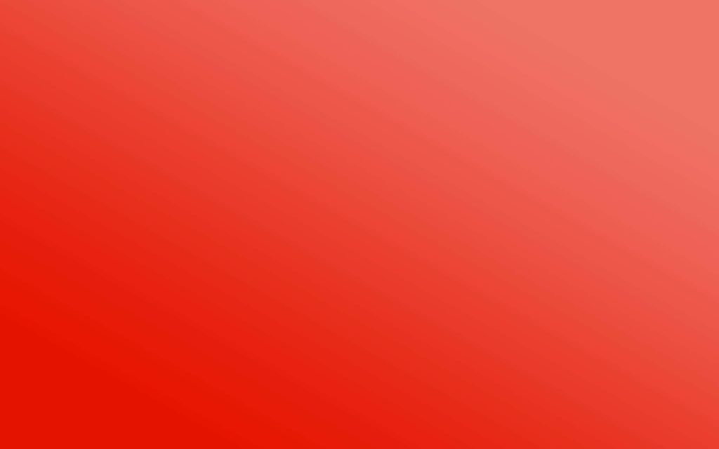Minimalist light red wallpaper with smooth gradient from deep warm to bright vibrant red background