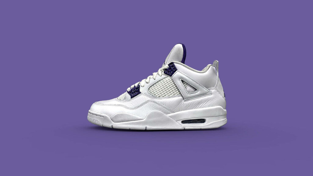 Elevated Elegance: A Sleek Glimpse of Michael Jordan Shoes on a Vibrant Purple Canvas Wallpaper