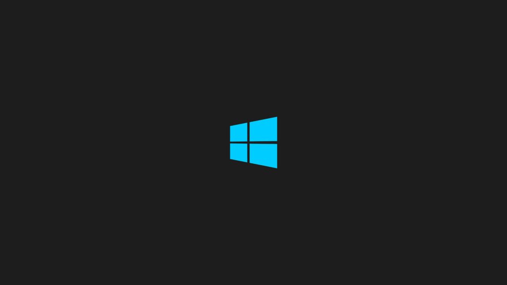 Minimalist desktop wallpaper with bright blue Microsoft Windows logo on dark grey background