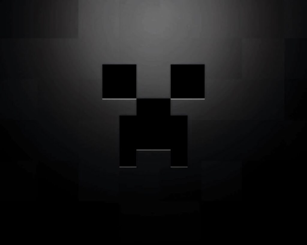 Minimalist Minecraft Creeper face wallpaper black pixel art on dark gray gradient background