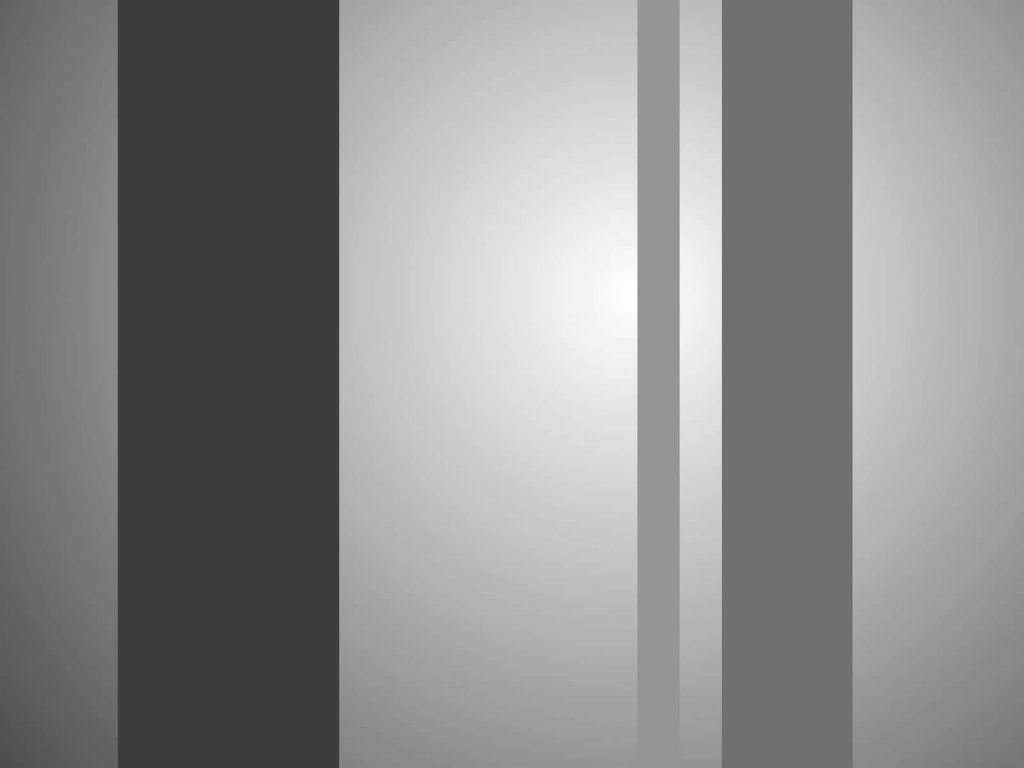 Minimalist desktop wallpaper with vertical dark and medium grey stripes on light grey gradient