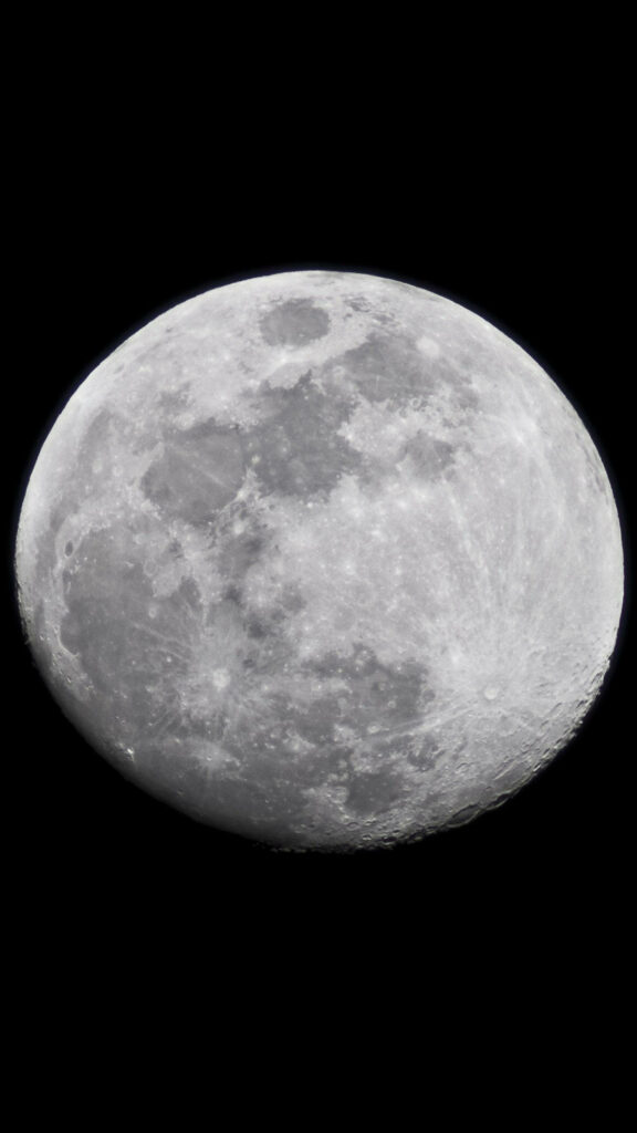 Minimalist Moon Wallpaper: Glowing Design on Black Background