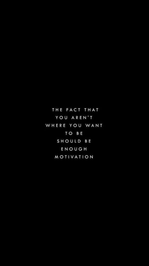 Inspiring Minimalist Wallpaper with Motivational Quote on Black Background