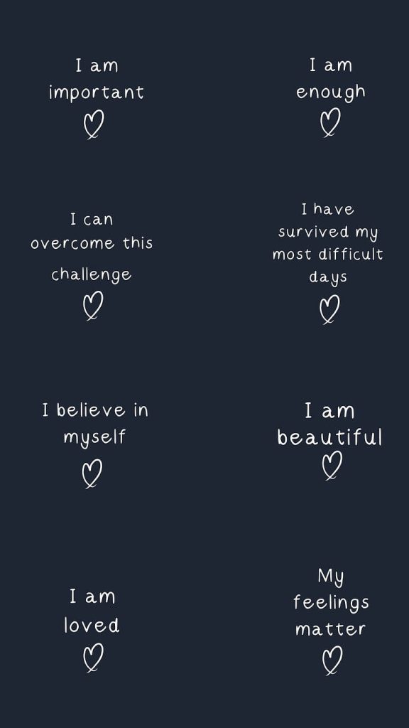 Minimalist motivational wallpaper with white affirmations on dark navy for daily self-love boost