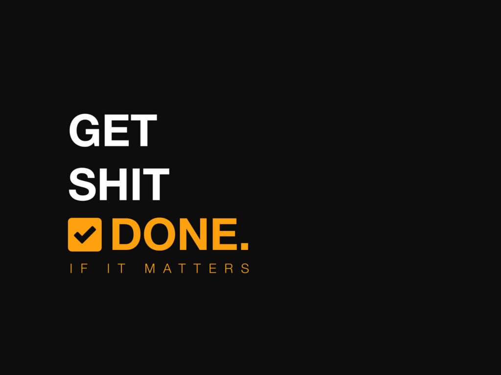 Motivational wallpaper with bold white and orange text on black background saying Get Shit Done if It Matters