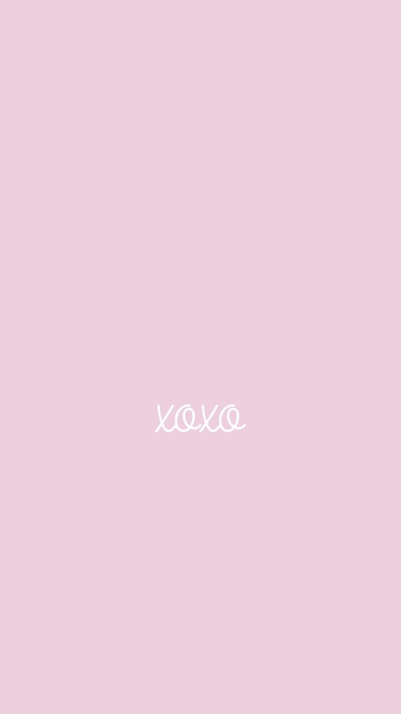 Minimalist pink wallpaper with white cursive xoxo text soft pastel romantic mobile background