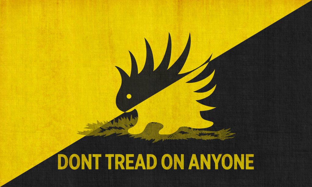 Minimalist porcupine silhouette with Dont Tread On Anyone text on yellow and black wallpaper