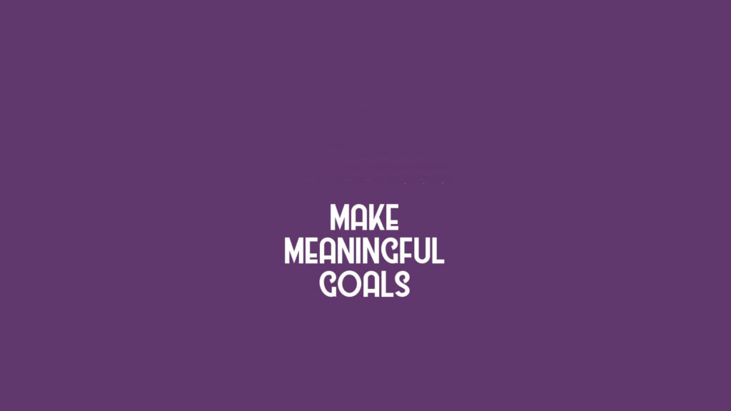Minimalist Purple Wallpaper: Bold 'Make Meaningful Goals' Design