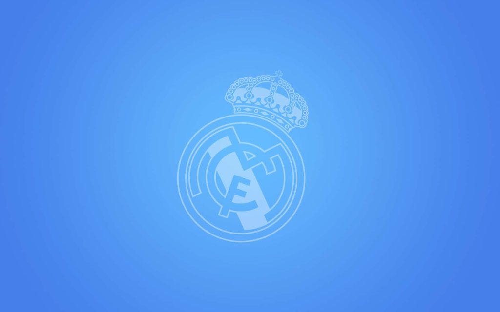 Minimalist Real Madrid wallpaper with iconic crest on vibrant blue background for fans