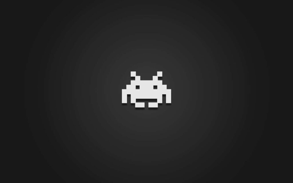 Minimalist Retro Alien Wallpaper on Dark Gradient Background