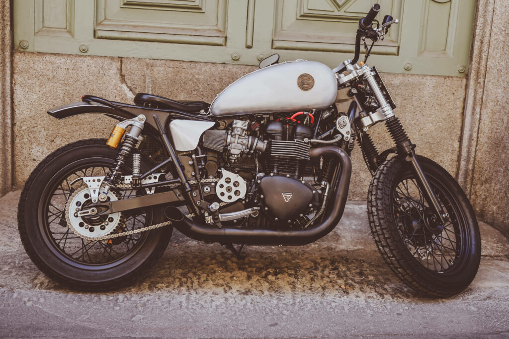 Stylish Retro Bobber Motorcycle Wallpaper - Minimalist Vintage Design