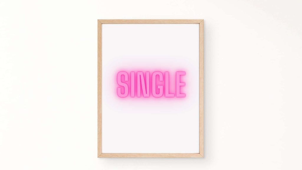 Minimalist wallpaper with glowing pink neon SINGLE text in light wooden frame on white background