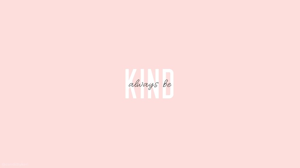 Minimalist pastel pink wallpaper with bold KIND text and cursive always be quote for positivity
