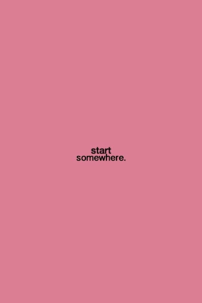 Minimalist dusty pink wallpaper with start somewhere quote in black serif font motivational background