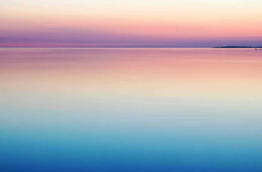 Minimalist Sunset Wallpaper: Tranquil Pastel Waters Background