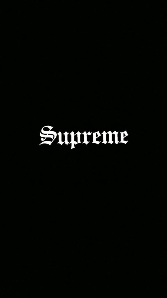Minimalist Supreme wallpaper with white Old English font on black background for sleek display