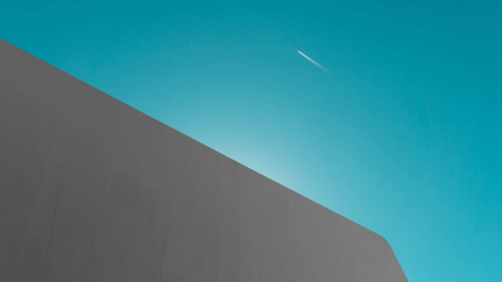 Minimalist Teal Sky Wallpaper with White Streak & Grey Structure