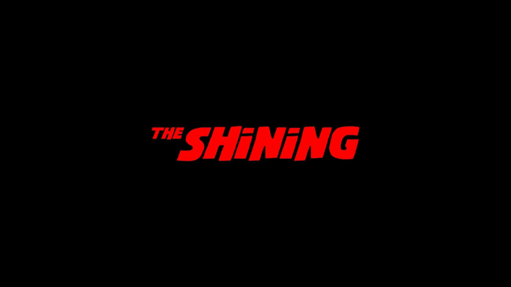 Bold 'The Shining' Wallpaper: Minimalist Red Text on Black Background